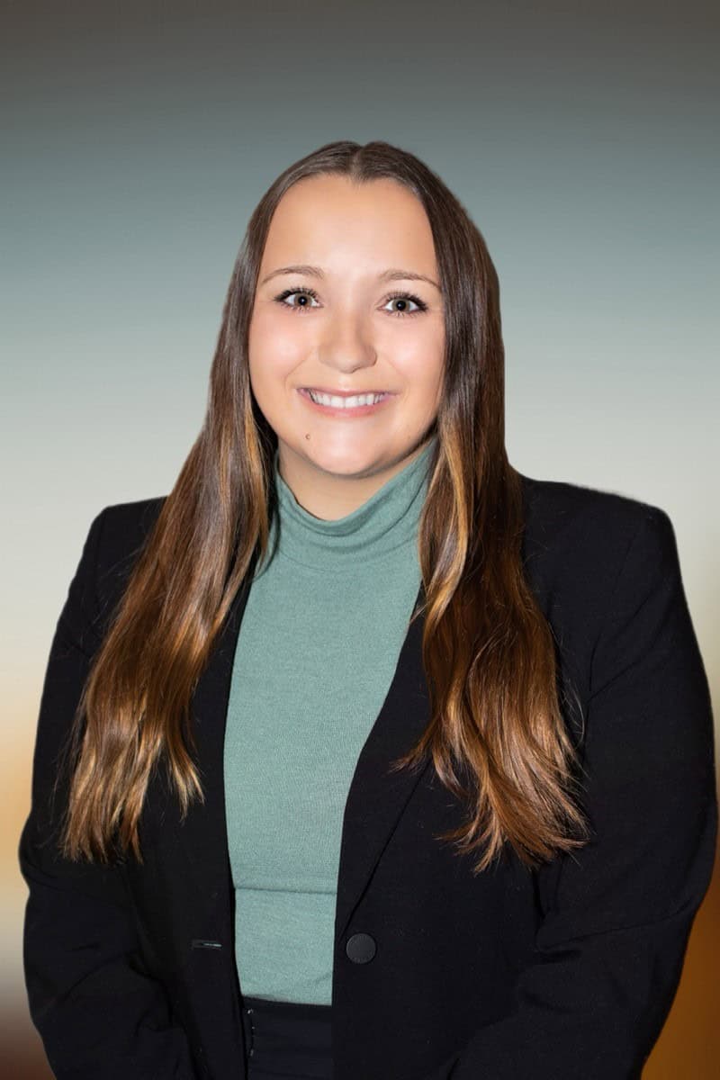 Alyssa Meixelsperger, LCSW, CADC, smiling in professional attire, representing Serengeti Wellness, a Chicago-based therapy provider specializing in culturally attuned eating disorder treatment.