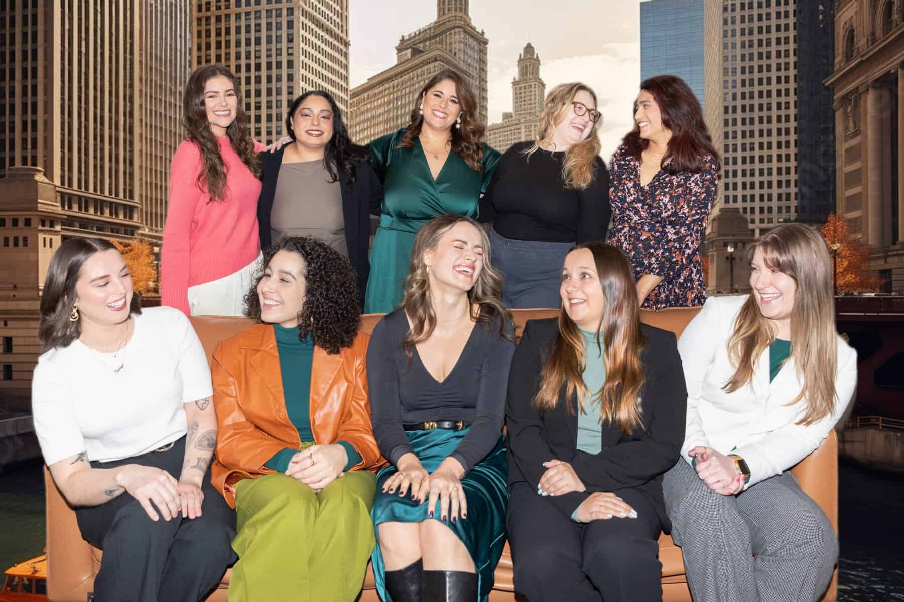 Group photo of the Serengeti Wellness management team, featuring smiling women in professional attire, showcasing leadership and camaraderie against an urban backdrop, emphasizing their commitment to mental health support.
